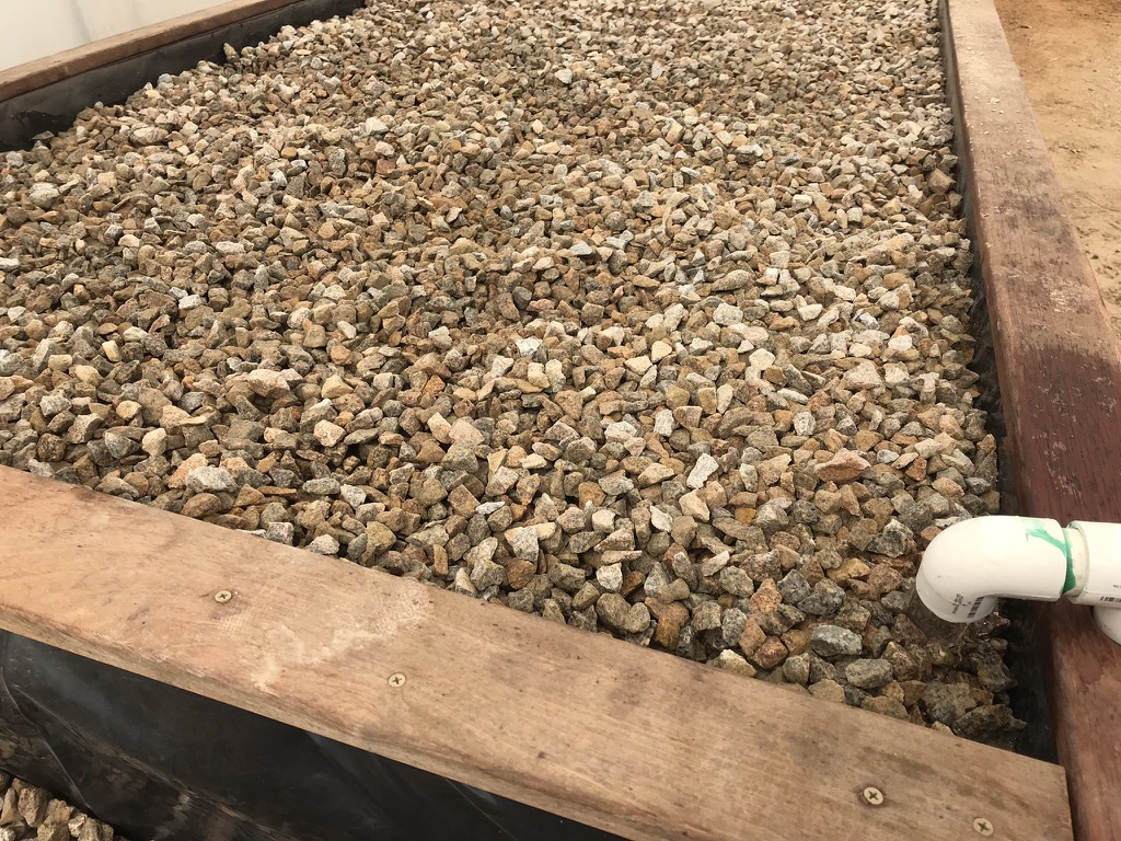 Media-filled aquaponics grow bed at King Valley Aquaponics